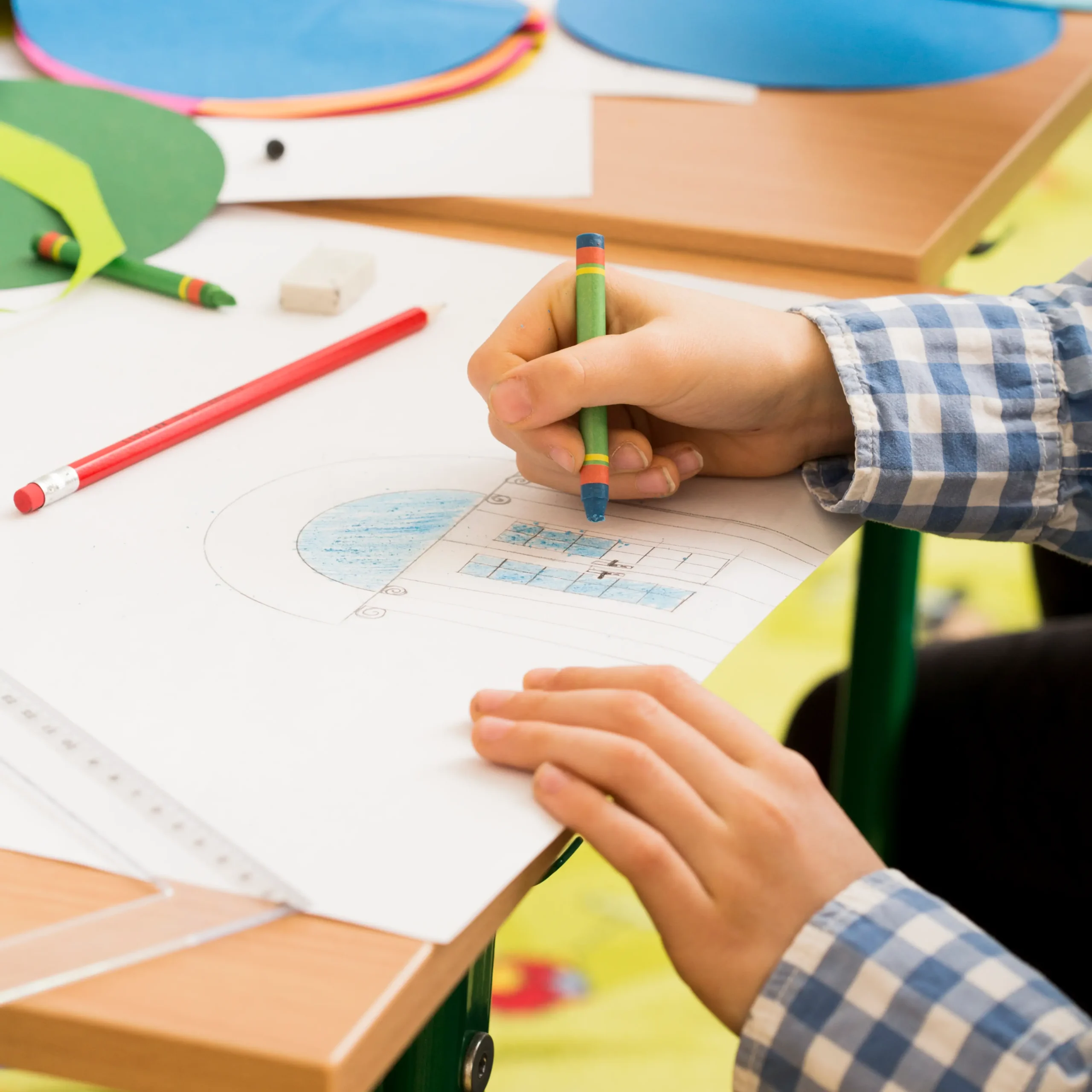 child-drawing-with-crayon-on-paper-at-table-2026-03-10-03-12-01-utc 1